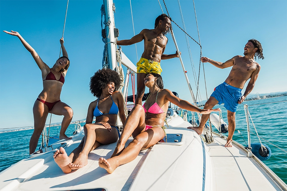 smiling people on a sailing boat as an example of increasing influencer engagement