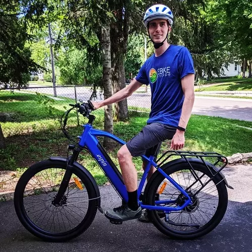 Man on a blue espin bike