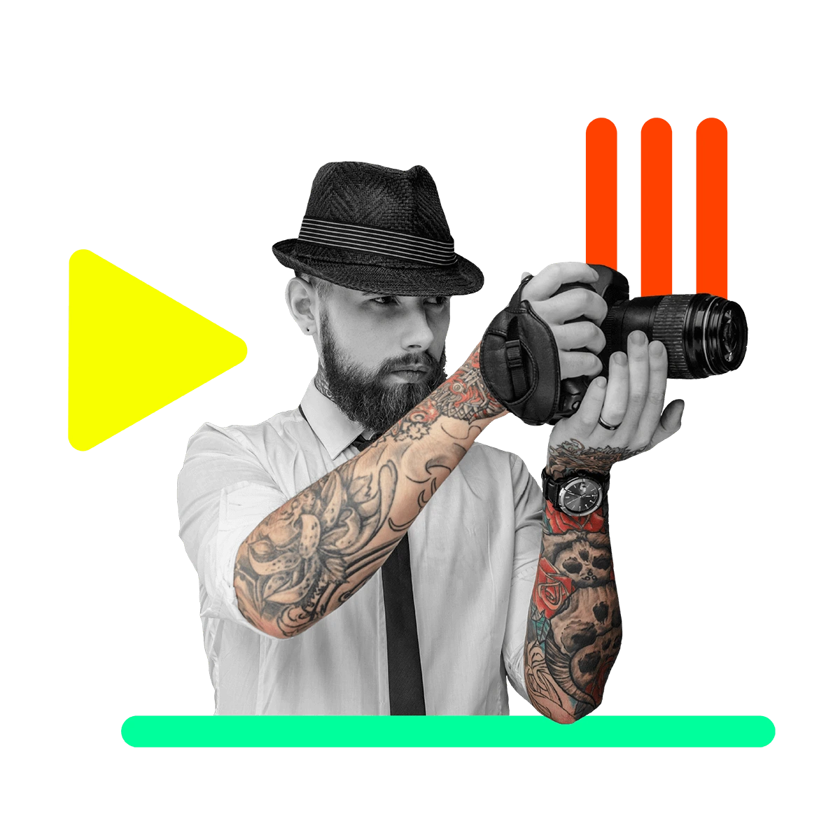 Tattooed man in a hat holding up a camera by colorful shapes