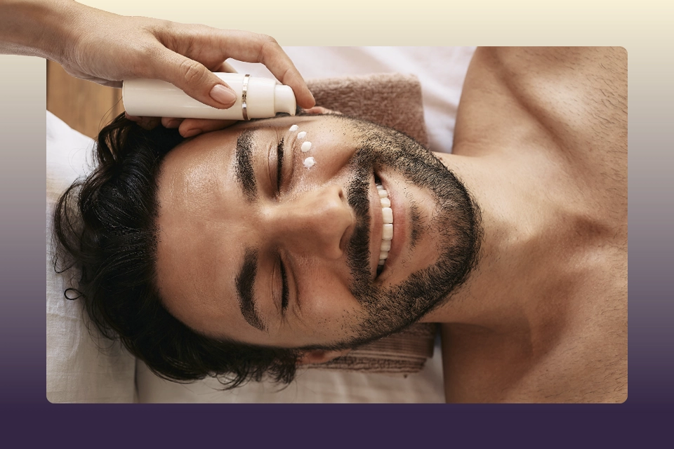 Man getting a facial in an example of spa marketing ideas