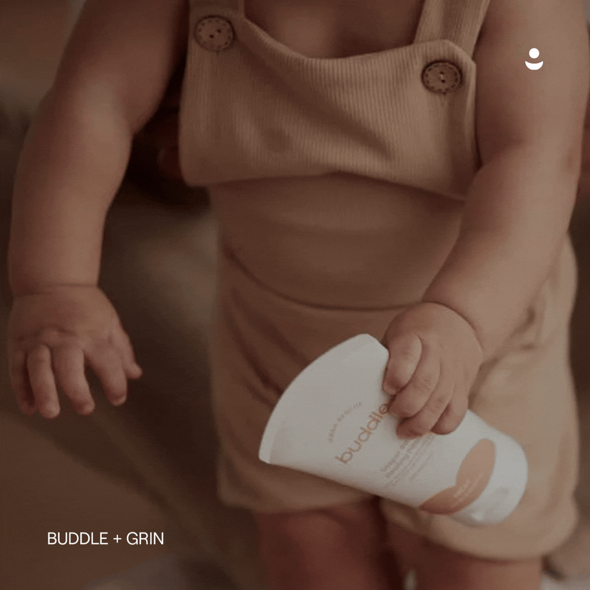 a woman holding up a RoseSkinCo. hair removal product