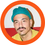 Headshot of a man with sunglasses in a blue circle